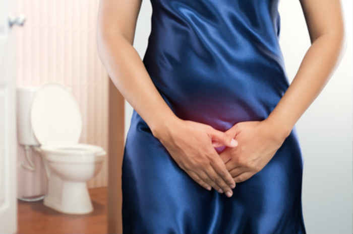 donna con difficoltà urinarie